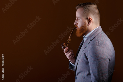 man smoking a pipe