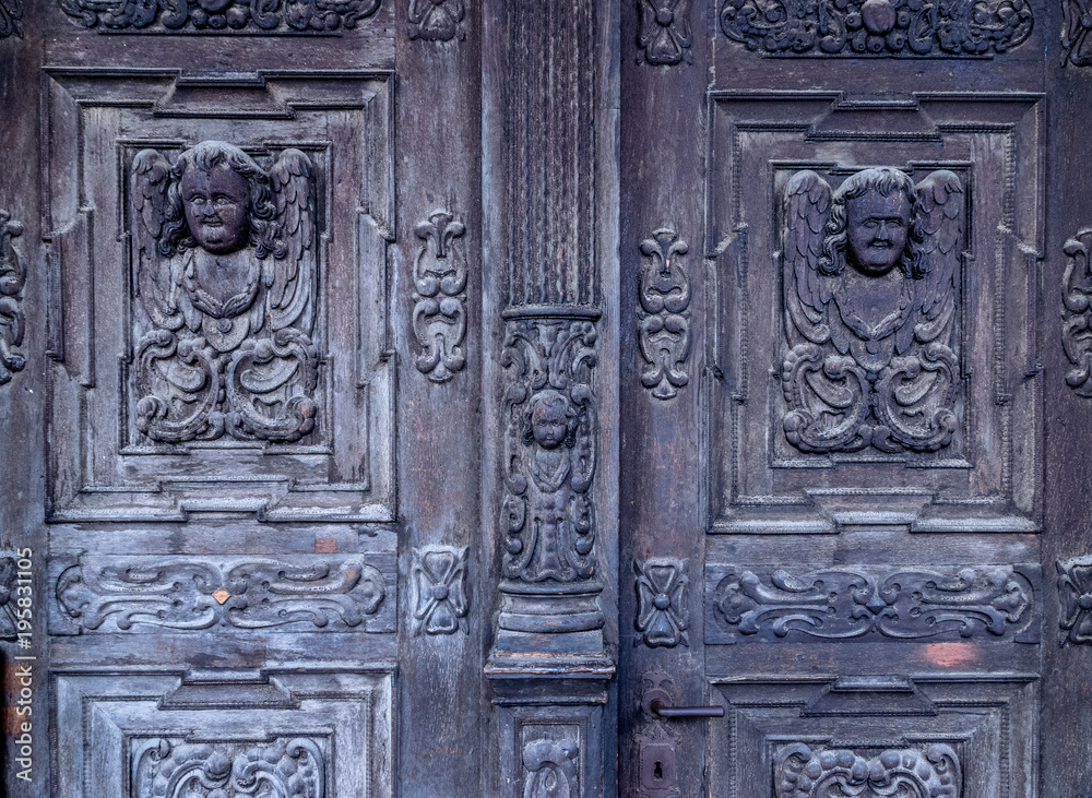 Medieval Gothic Church wooden door detail in Sibiu, Romania