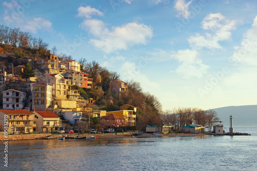 Winter view of small Mediterranean town of Lepetane.  Montenegro, Bay of Kotor photo