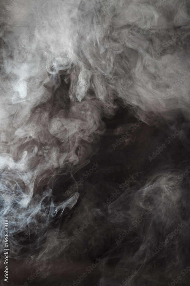 White smoke texture on a black background. Texture and abstract art White smoke texture on a black background. Texture and abstract art