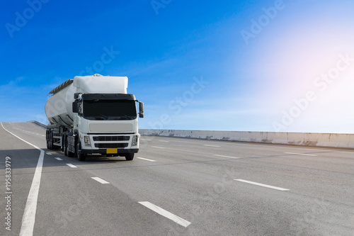 Gas or oil Truck on highway road container, transportation concept.,import,export logistic industrial Transporting Land transport on the asphalt expressway © BigBlues