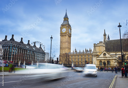 car traffic in London city. Big Ben in background  long exposure photo