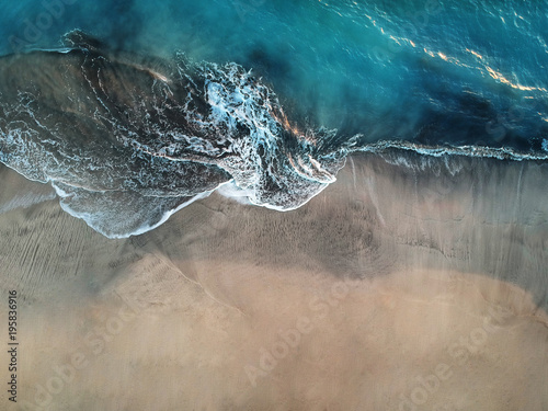 Aerial view of ocean waves and fantastic beach in the Canary Island © Maksym Ukraine