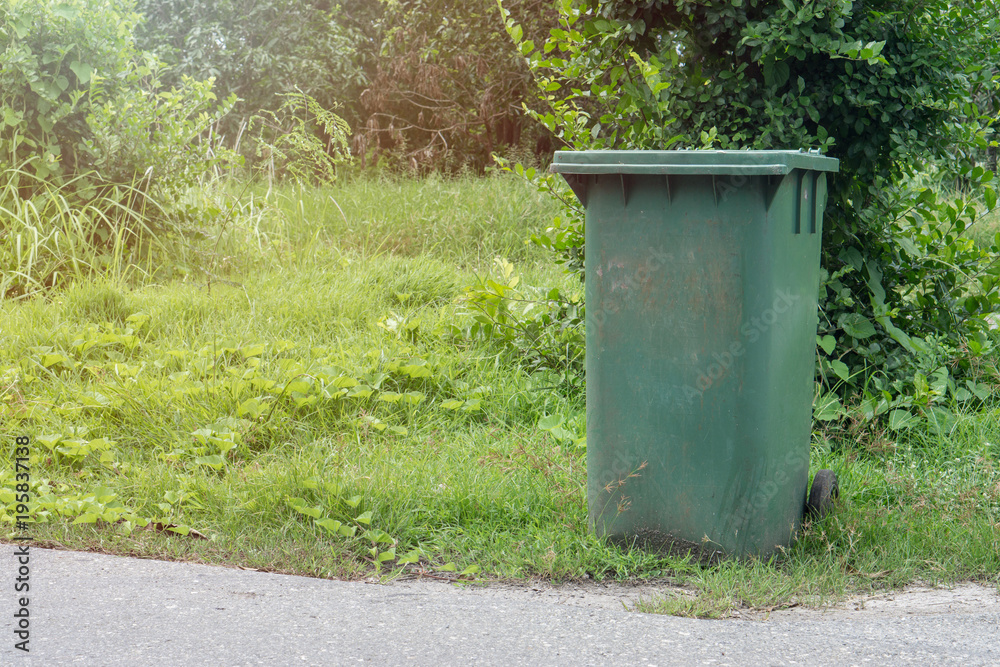 Green recycling bins in the parks., with copy space for text. Green recycling bins in the parks., with copy space for text.