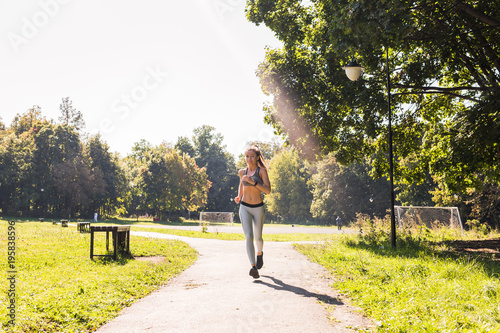 healthy lifestyle young fitness woman running outdoors