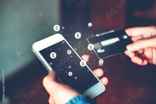 Online banking businessman using smartphone with credit card Fintech and Blockchain concept photo