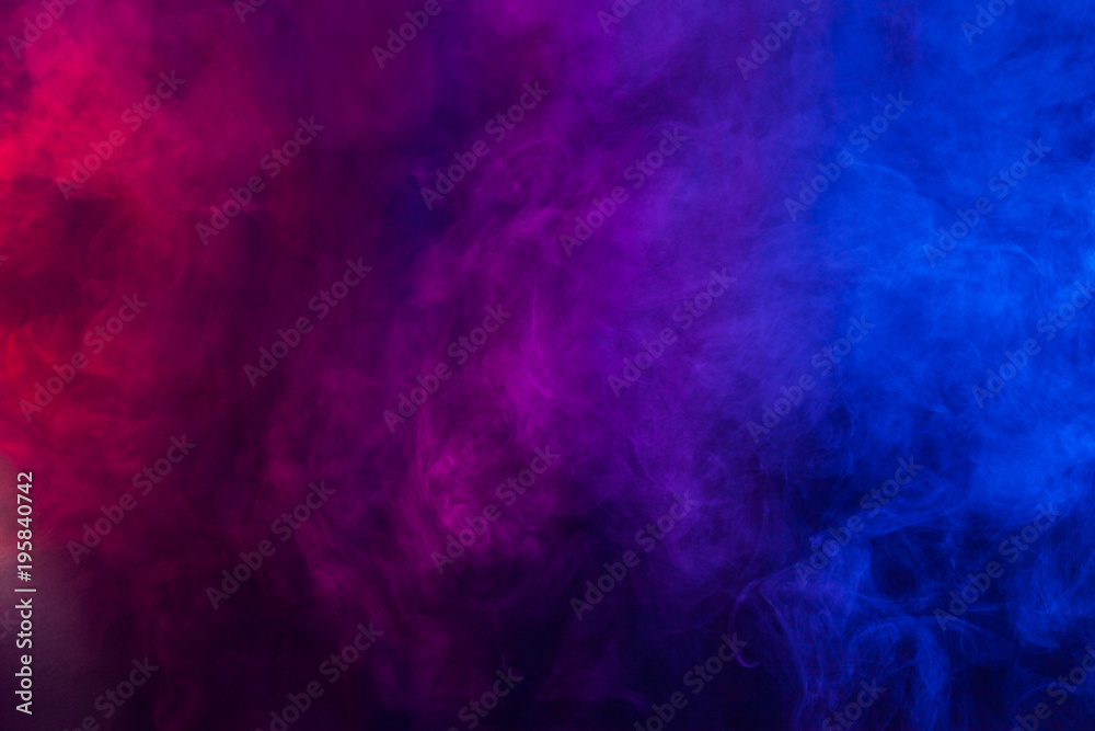 Violet and blue smoke or flame texture on a black background. Texture and abstract art