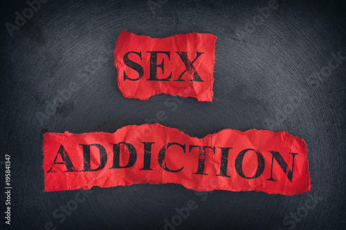 Crumpled pieces of paper with the words Sex Addiction