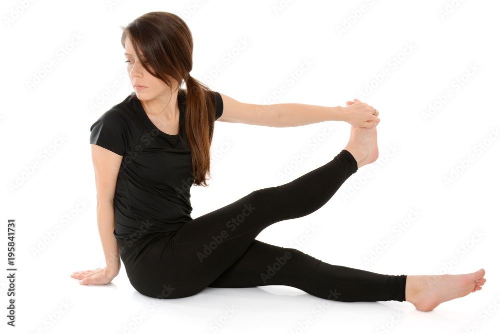 Dandasana twist. Young woman doing yoga isolated on white background, Dandasana twist. Young woman doing yoga isolated on white background,
