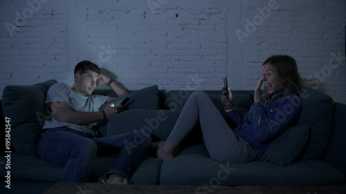 boyfriend using relaxed mobile pone gets jealous and upset when his girlfriend gets a video call from a friend