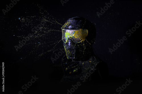Fototapeta Naklejka Na Ścianę i Meble -  Splash after direct hit to protecting mask in the paintball game