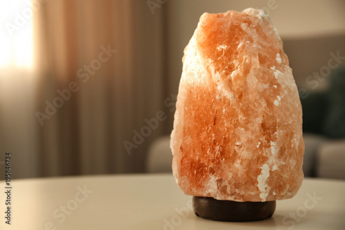 Himalayan salt lamp on tabl...