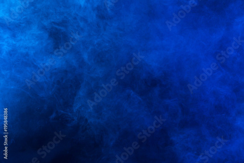 Blue smoke  texture on a black background. Texture and abstract art