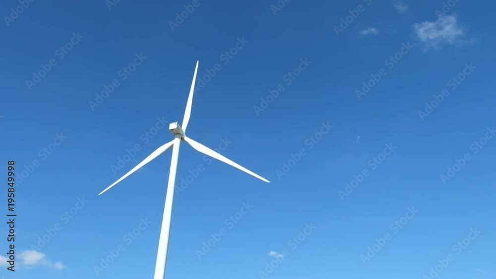 Wind turbine farm in the field - a renewable energy source Wind turbine farm in the field - a renewable energy source