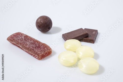 Candies and chololate in a white background photo