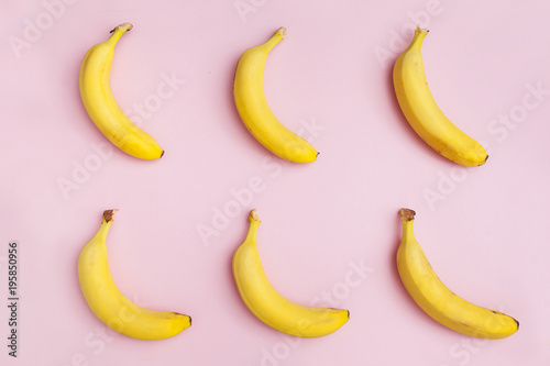 background of bananas on a pink background