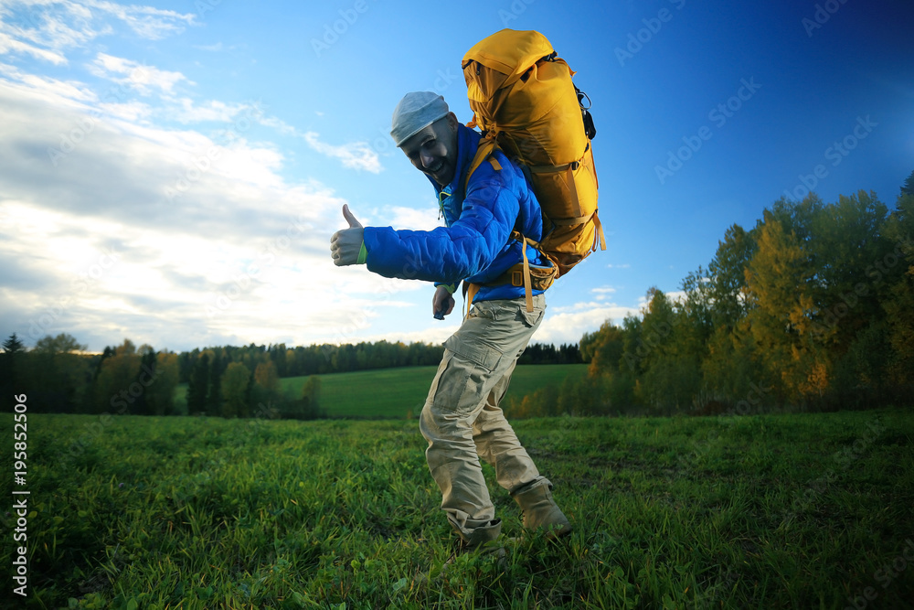 man with backpack, tourist, brutal journey, hike, the concept of active male recreation, portrait of a severe, brutal man, guy preparing equipment for the mountains man with backpack, tourist, brutal journey, hike, the concept of active male recreation, portrait of a severe, brutal man, guy preparing equipment for the mountains