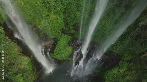 Aerial view of Waterfall in green rainforest