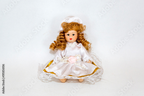 Toy doll made of fabric and safe plastic for children's games 