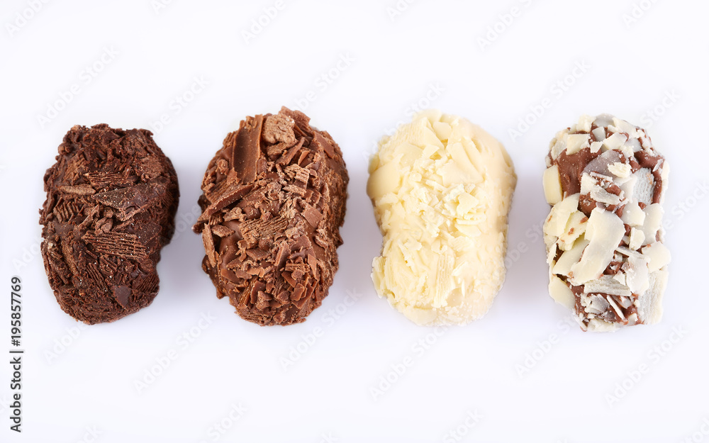 Assortment of chocolate candies sweets isolated on a white background. Chocolate candies collection. Assortment of chocolate candies sweets isolated on a white background. Chocolate candies collection.