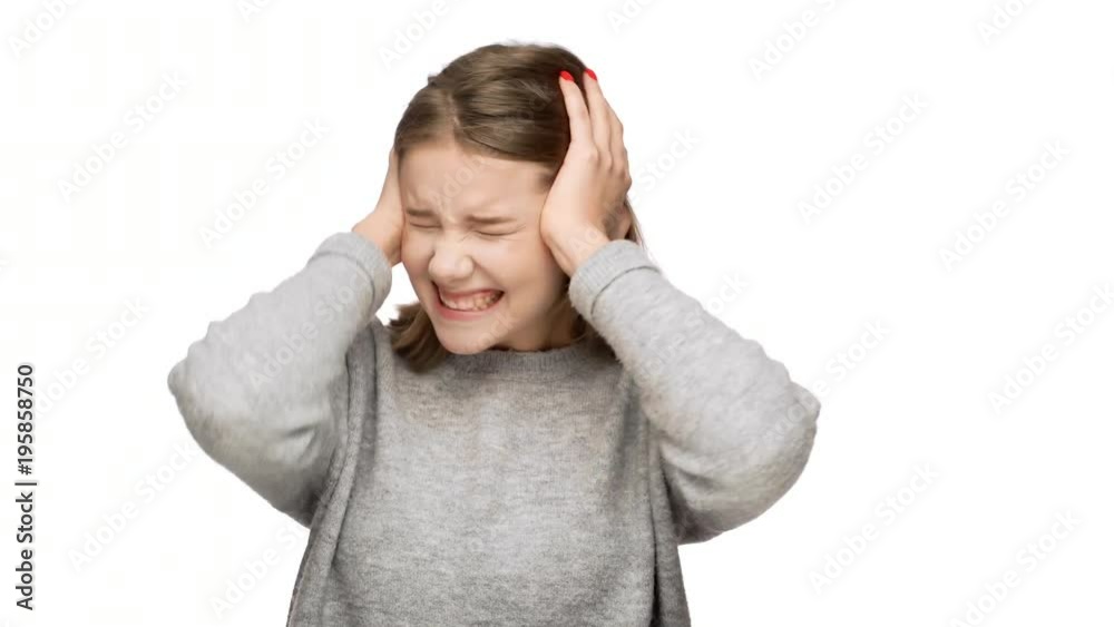 Portrait of disappointed woman 20s with brown hair grabbing her head and screaming in confusion or fear, isolated over white background. Concept of emotions Portrait of disappointed woman 20s with brown hair grabbing her head and screaming in confusion or fear, isolated over white background. Concept of emotions