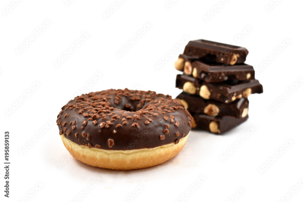 Chocolate donut and Pile of chocolate stock images. Donut on a white background. Donut with chocolate frosting Chocolate donut and Pile of chocolate stock images. Donut on a white background. Donut with chocolate frosting