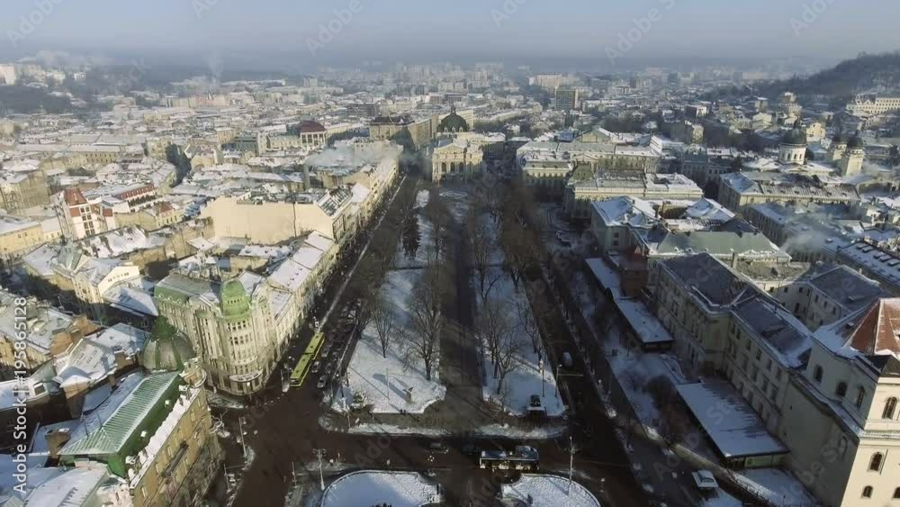 Aerial View of Lviv City Centre in snow from above in winter. Lviv, Ukraine. Aerial View of Lviv City Centre in snow from above in winter. Lviv, Ukraine.