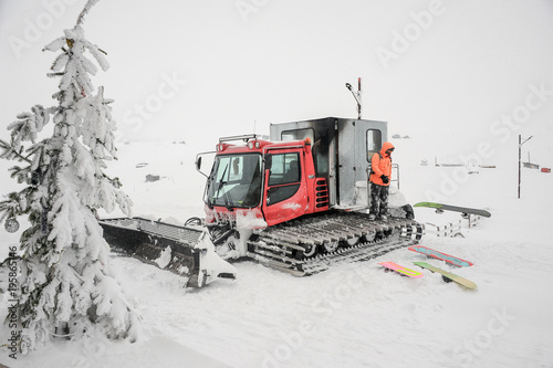 Snowborder standing on the snow plough in Goderdzi, Georgia