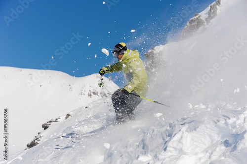 Skier running down the slope in beautiful Gudauri, Georgia