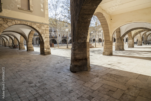 Archs in main square of Banyoles,Catalonia,Spain. photo