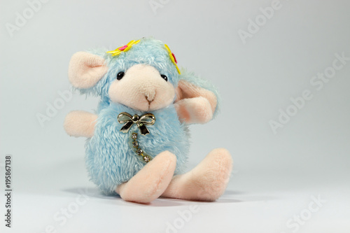 Blue Sheep Doll from white background
