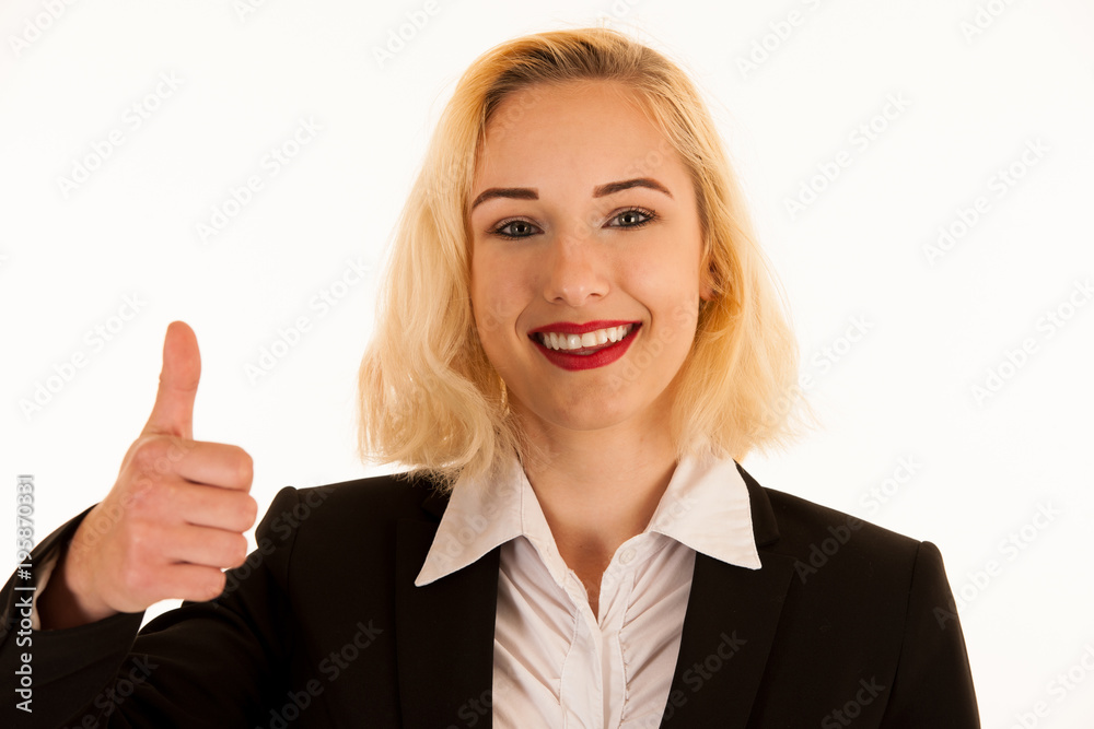 Attractive blonde woman shows thumb up as a gesture for success isolated over white background Attractive blonde woman shows thumb up as a gesture for success isolated over white background