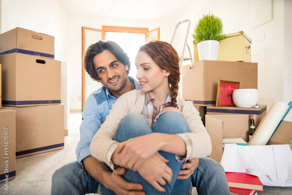 Couple moving into new house Couple moving into new house