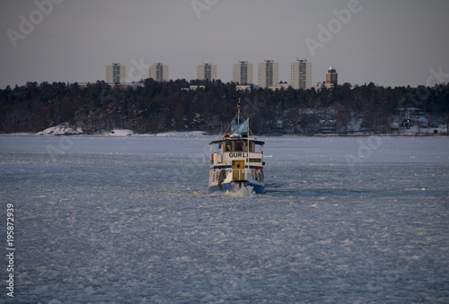 Boat in the archipelago of Stockholm photo