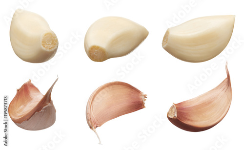 Peeled and unpeeled cloves of garlic in different angles