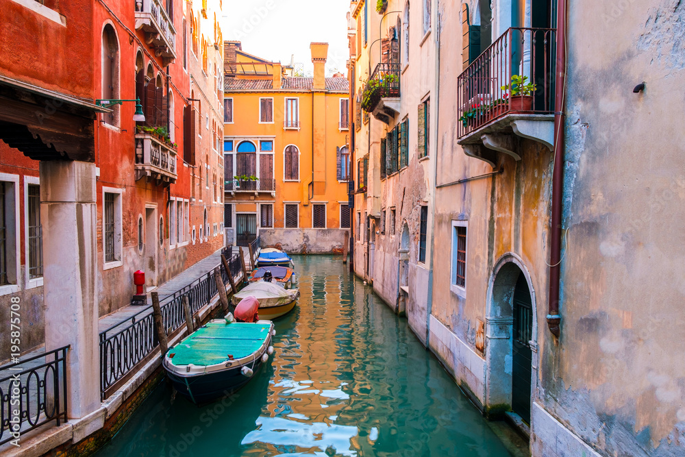 Venice cityscape, narrow water canal