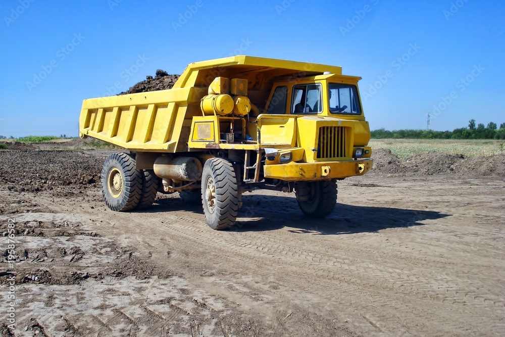 Dump truck on the construction site