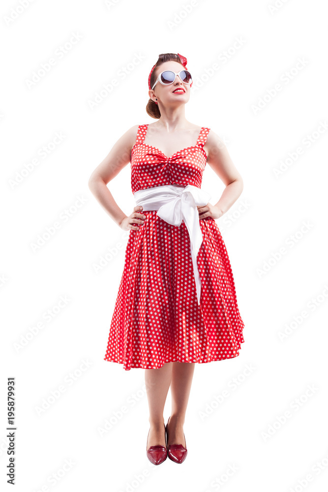 Beautiful young woman with pin-up make-up and hairstyle posing on white background Beautiful young woman with pin-up make-up and hairstyle posing on white background