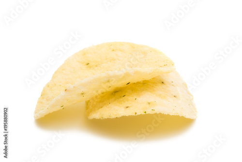 Salted potato chips isolated