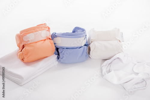 reusable washable ecological organic cotton nappy nappies on white background  photo