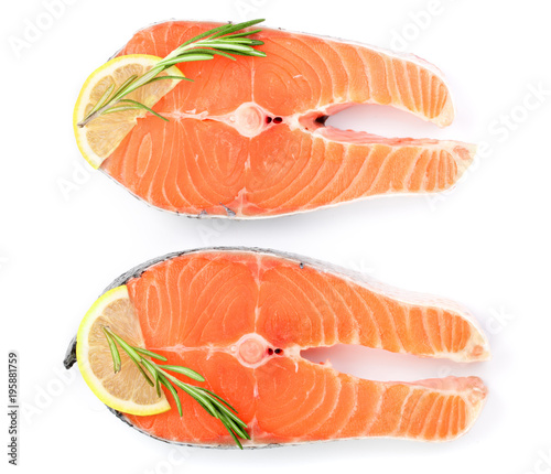 Slice of red fish salmon with lemon and rosemary isolated on white background. Top view. Flat lay