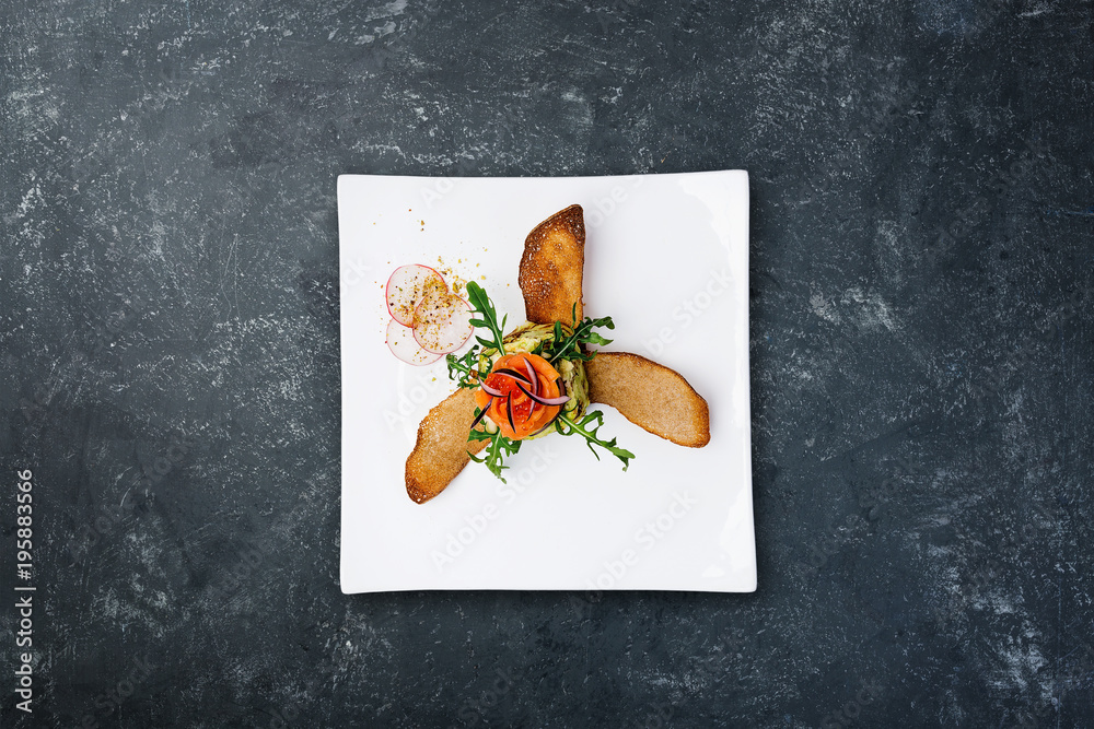 Appetizer from zucchini and salted salmon with red caviar. Appetizer from zucchini and salted salmon with red caviar.