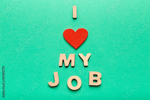 Wooden letters spelling I love my job phrase photo