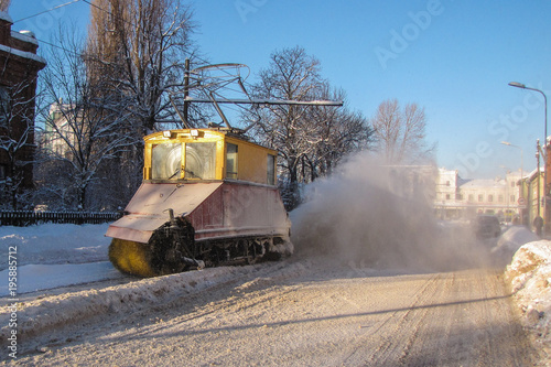 Old railroad snow cleaning tram in action. Winter, streetcar.