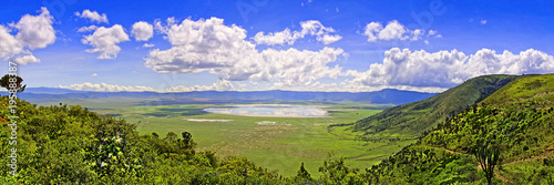 Panoramic view of Crater  Ngorongoro at the afternoon/ View from the height of the world famous reserve Ngoro ngoro where the remains of the very first person were found photo