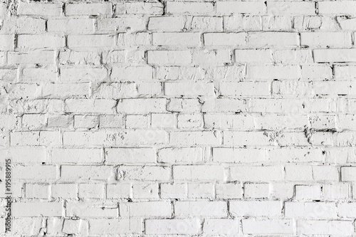 White brick wall texture. Aged wheathered background. Abstract white textured pattern