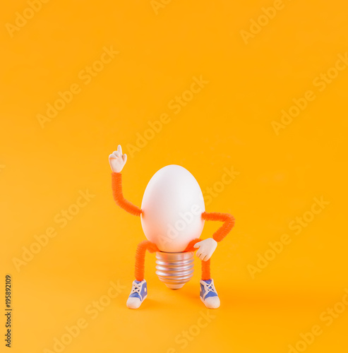 Easter egg toy in the shape of a light bulb on a yellow