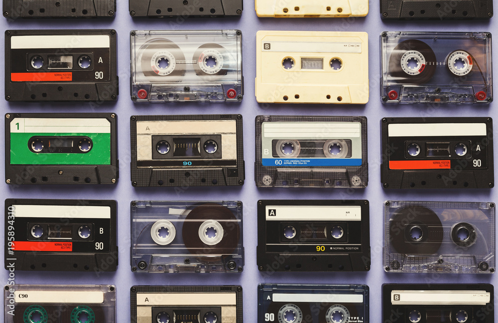 Fototapeta premium Vintage audio cassettes blue background