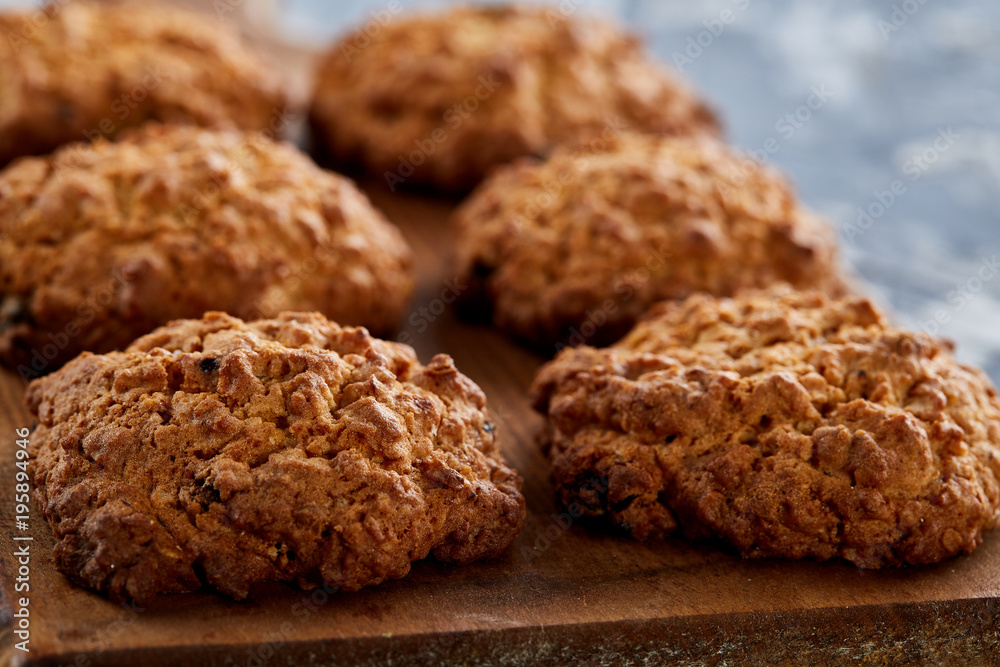 Top view close-up picture of tasty cookies on the cutting board, shallow depth of field, selective focus Top view close-up picture of tasty cookies on the cutting board, shallow depth of field, selective focus