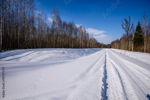 snowy winter road covered in deep snow © Martins Vanags